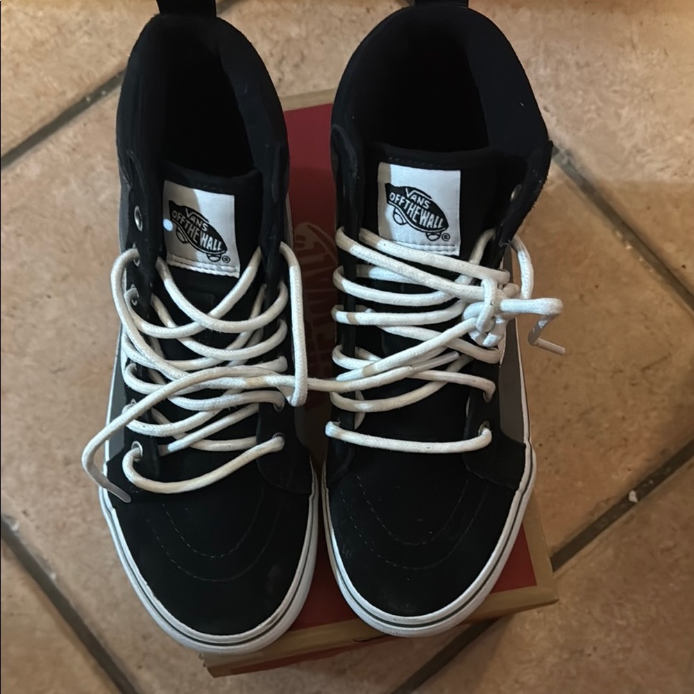 Vans Black and White High-Top Sneakers